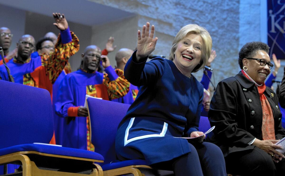Hillary Clinton with U.S. Rep. Marcia Fudge (D-Ohio) during a service at Mount Zion Fellowship Church in Highland Hills, Ohio, on March 13.