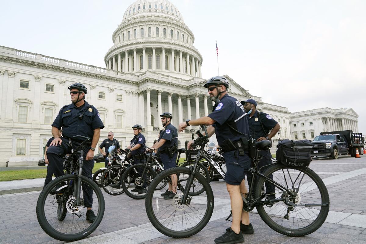 U.S. Capitol Police officers on bicycles in front of the Capitol