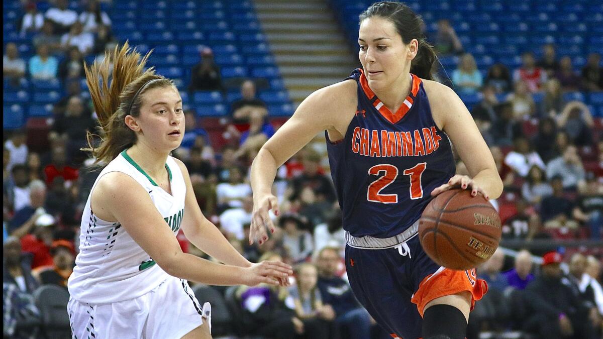 Isabel Newman (21) goes on the attack for Chaminade in the Open Division state girls' basketball championship game at Sleep train Arena in Sacramento on Saturday.