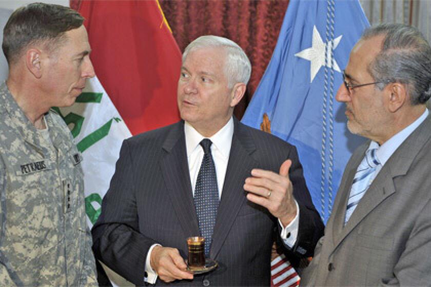 Gates' comments followed a meeting with the commander of U.S. forces in Iraq, Gen. David H. Petraeus, left, and Iraqi National Security Advisor Dr. Al Rubai'e.