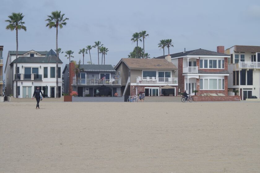 Short-term rentals are especially prevalent on the Balboa Peninsula in Newport Beach, with many facing the oceanside boardwalk shown here.
