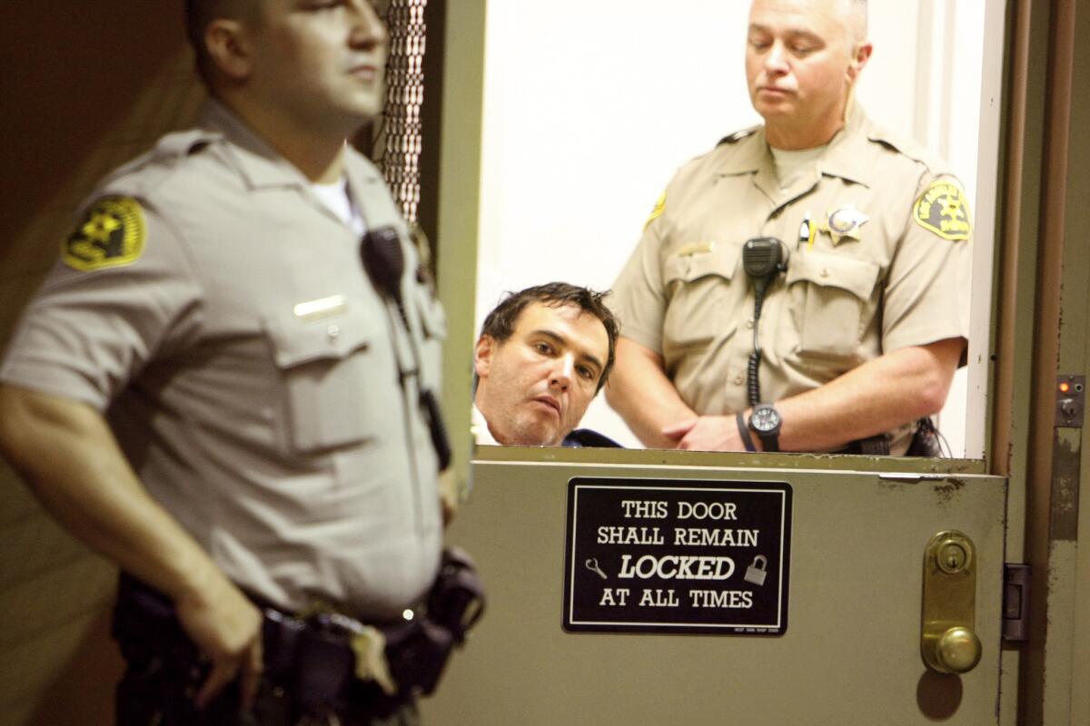 Michael Rodney Kane, shown in a Van Nuys courtroom in 2013, was convicted Monday of stabbing his estranged wife to death.