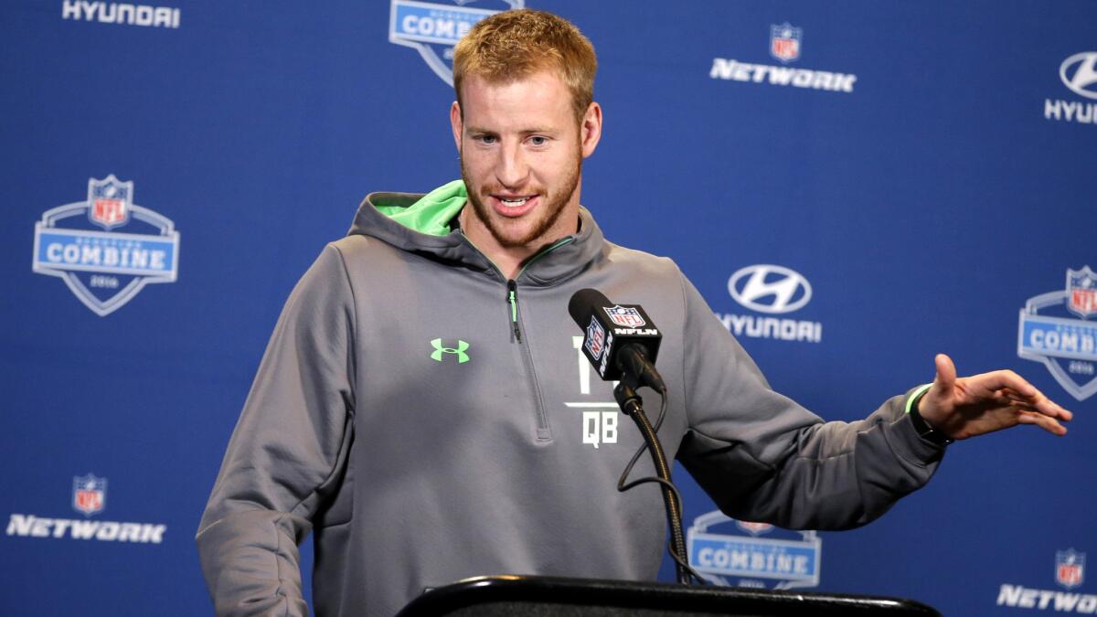 Carson Wentz answers a question during a news conference at the NFL combine on Feb. 25.