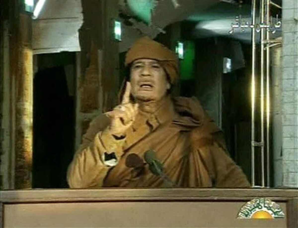 This image broadcast on Libyan state television on Feb. 22, 2011, shows Libyan leader Moammar Gadhafi as he addresses the nation in Tripoli, Libya. Gadhafi was ousted from power and assassinated later that year.