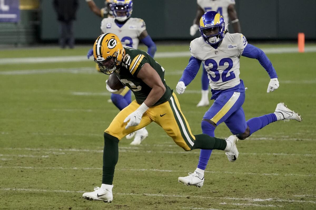 Green Bay Packers wide receiver Allen Lazard breaks away from Rams safety Jordan Fuller.