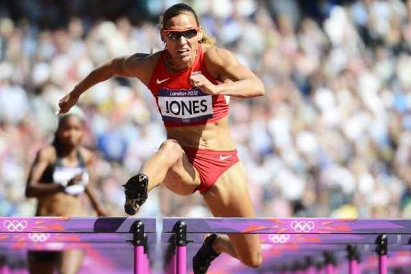 Lolo Jones competes in the 100-meter hurdles.