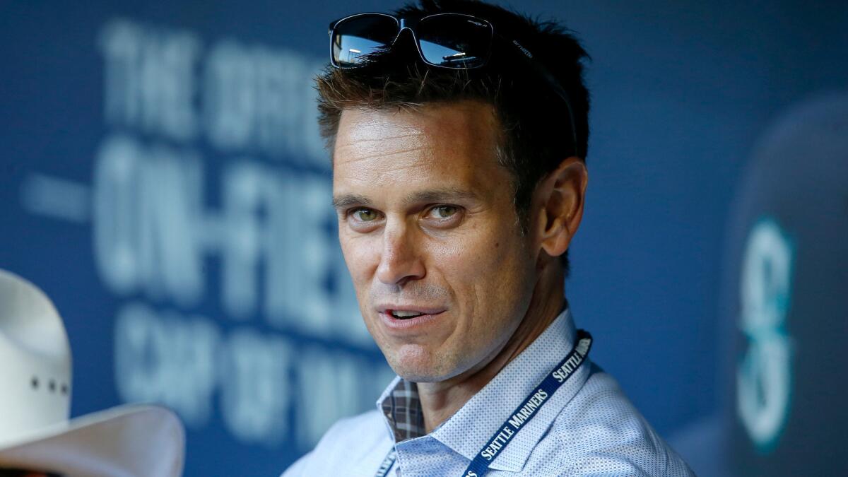Mariners General Manager Jerry Dipoto might add two former Angels colleagues to his front office in Seattle.