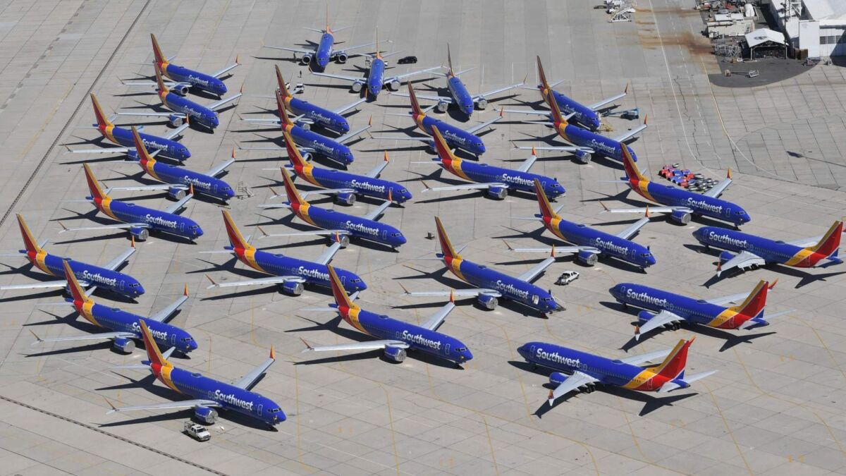 Southwest Airlines Boeing 737 Max planes parked on the tarmac at the Southern California Logistics Airport in San Bernardino County. The planes are grounded, awaiting a software fix.