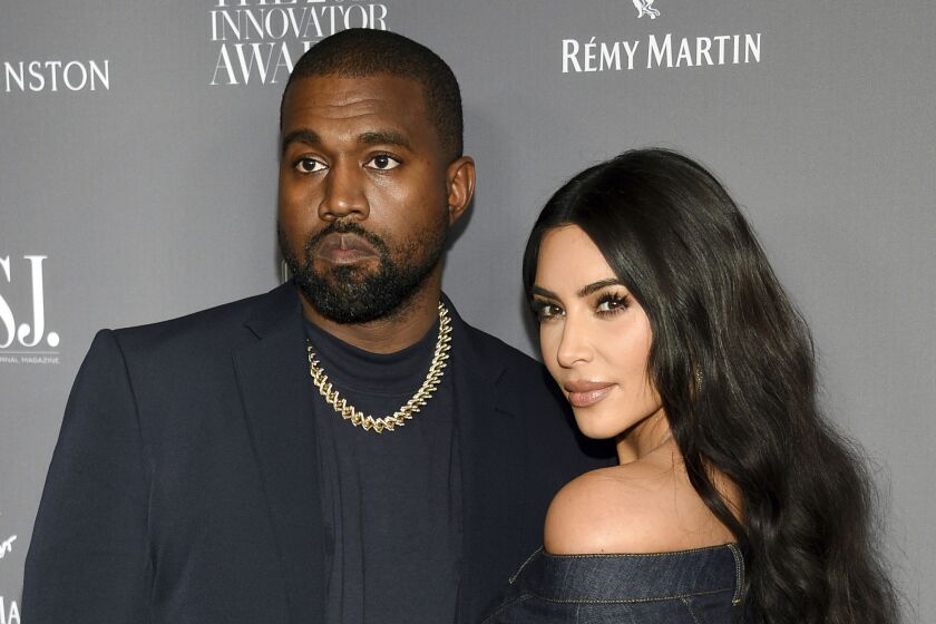 FILE - Kanye West, left, and Kim Kardashian attend the WSJ. Magazine Innovator Awards on Nov. 6, 2019, in New York. Kardashian became a single woman on Wednesday, nearly eight years after her marriage to Ye, who legally changed his name from Kanye West. (Photo by Evan Agostini/Invision/AP, File)
