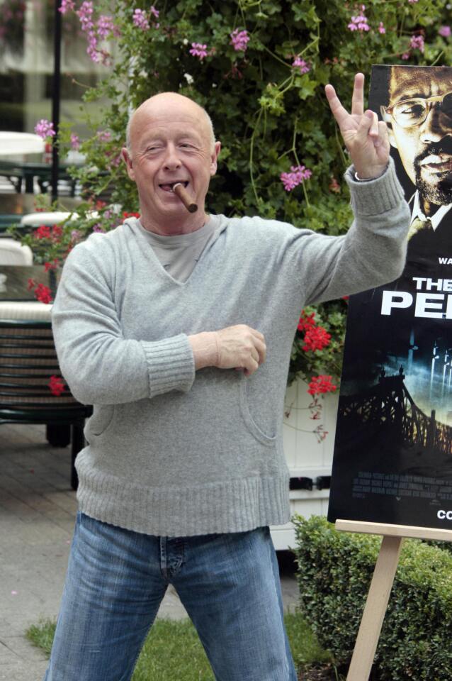Director Tony Scott poses in 2009 at a promotional event in Paris for "The Taking of Pelham 123," his remake of the 1974 film.