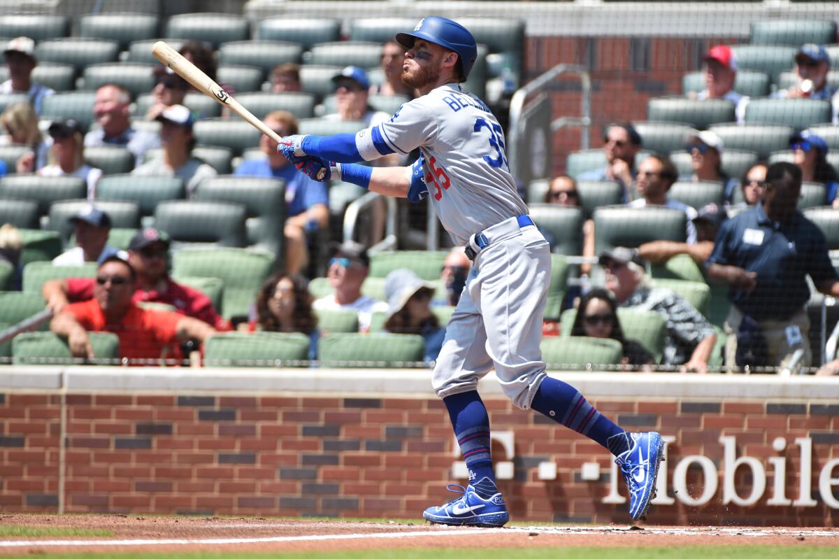 Cody Bellinger hits his 42nd home run of the season during the Dodgers' 5-3 loss to the Atlanta Braves on Sunday.