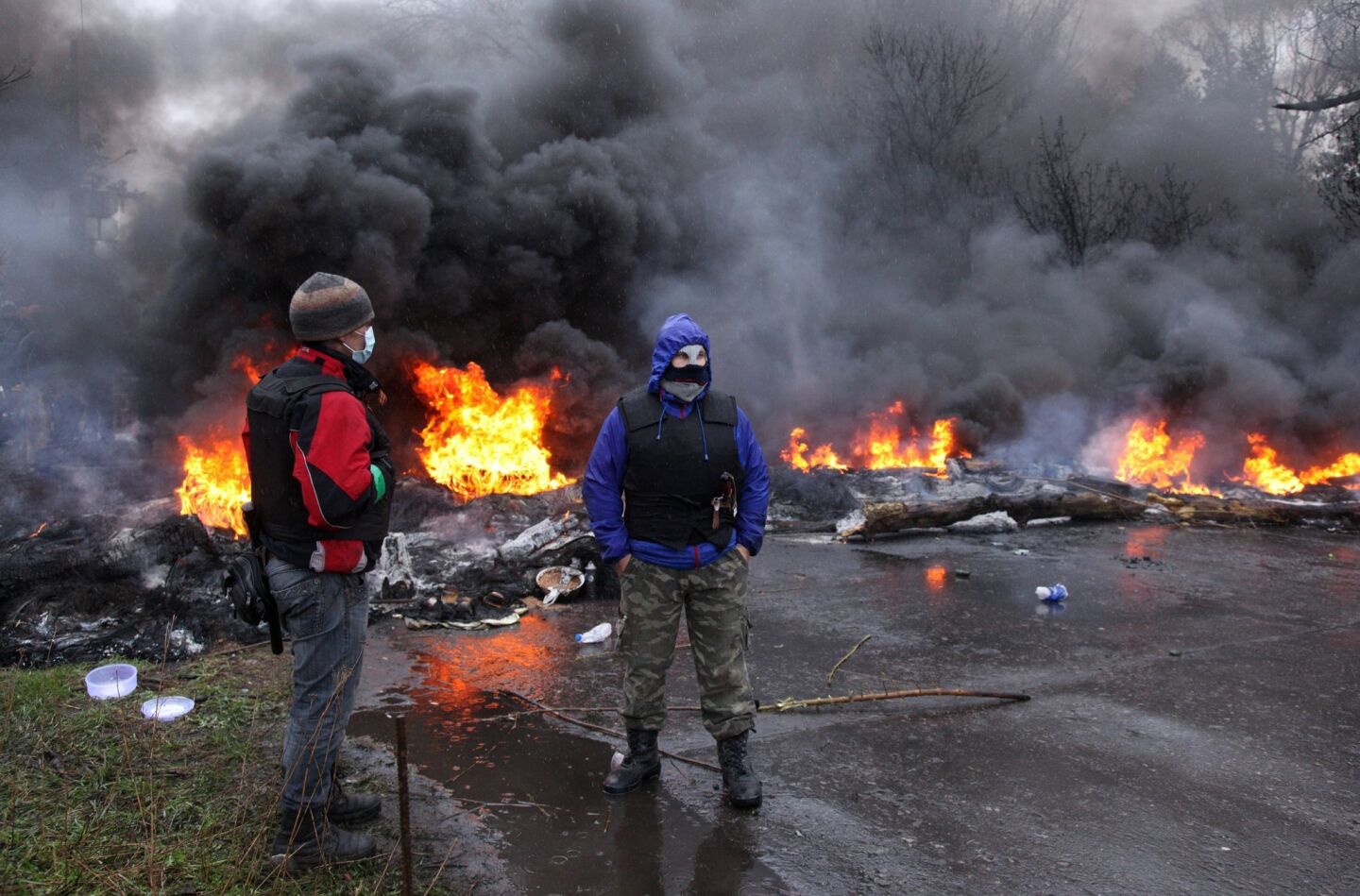 Pro-Russian protesters burn tires as they prepare for battle with Ukrainian special police forces on the outskirts of the eastern Ukrainian city of Slavyansk.