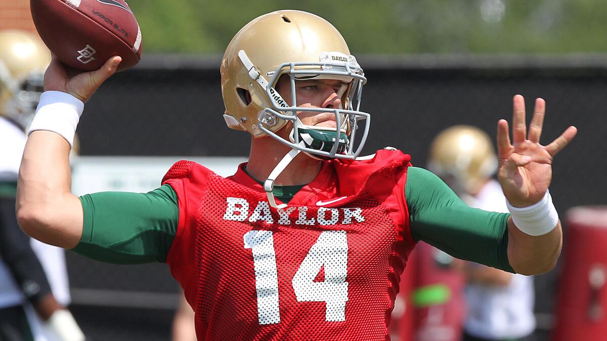 Baylor quarterback Bryce Petty passes during a practice session on Aug. 5. Will Petty be in the Heisman Trophy conversation this season?
