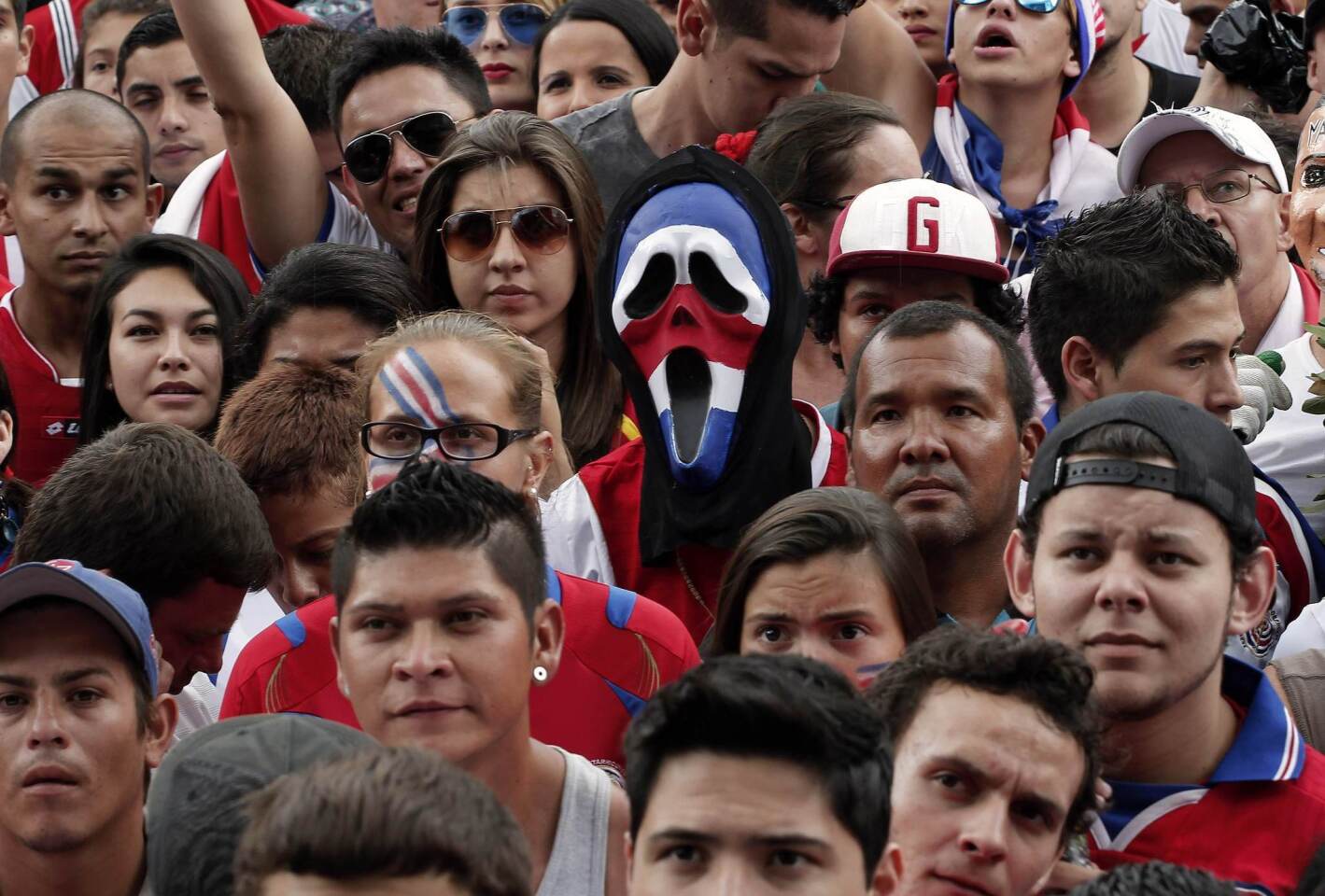 Fans of Costa Rica watch a broadcast of the 2014 World Cup round of 16 game between Costa Rica and Greece, in San Jose