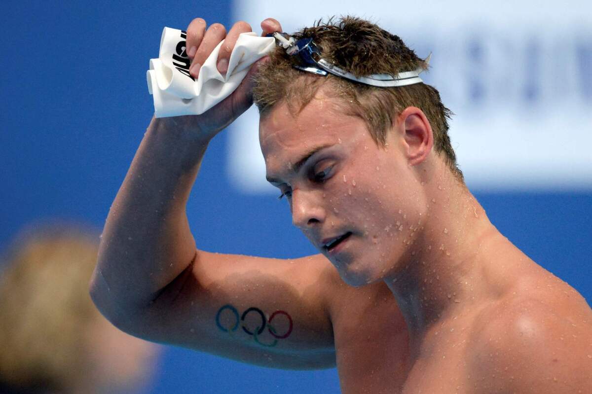 Russia's Vladimir Morozov removes his goggles after competing at the 2015 world championships in Kazan, Russia.