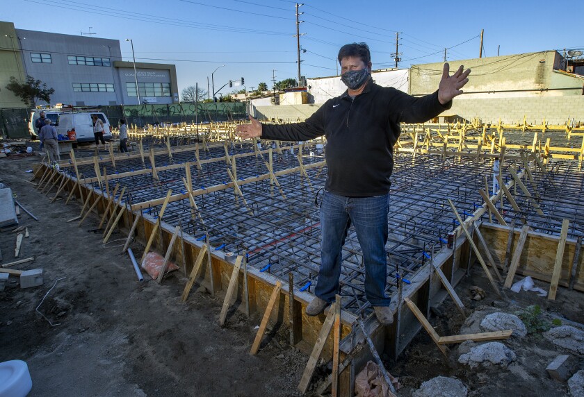Tim Roth, a developer for RMG Housing at a project site