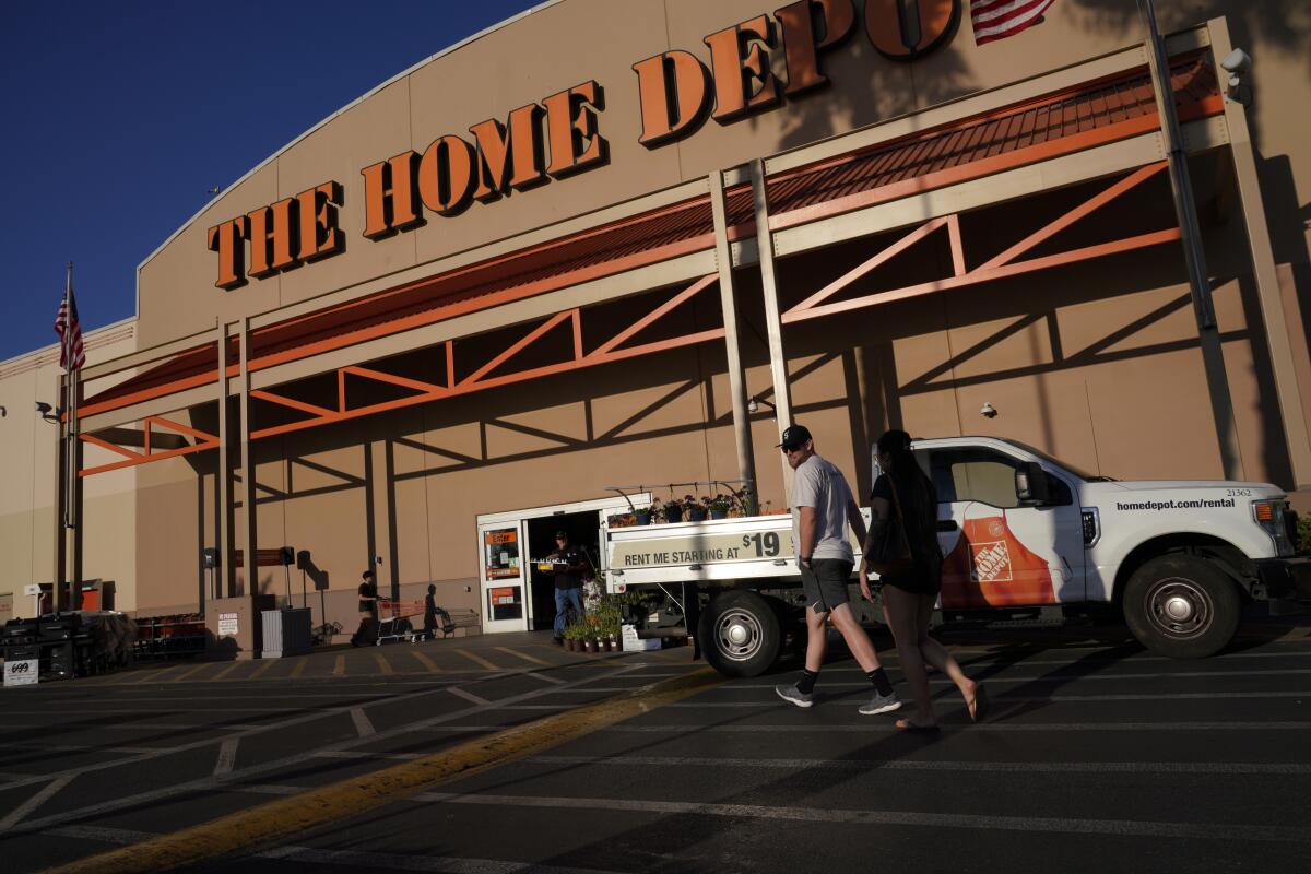 Home Depot violated employee rights in firing over 'BLM' on apron: labor  board