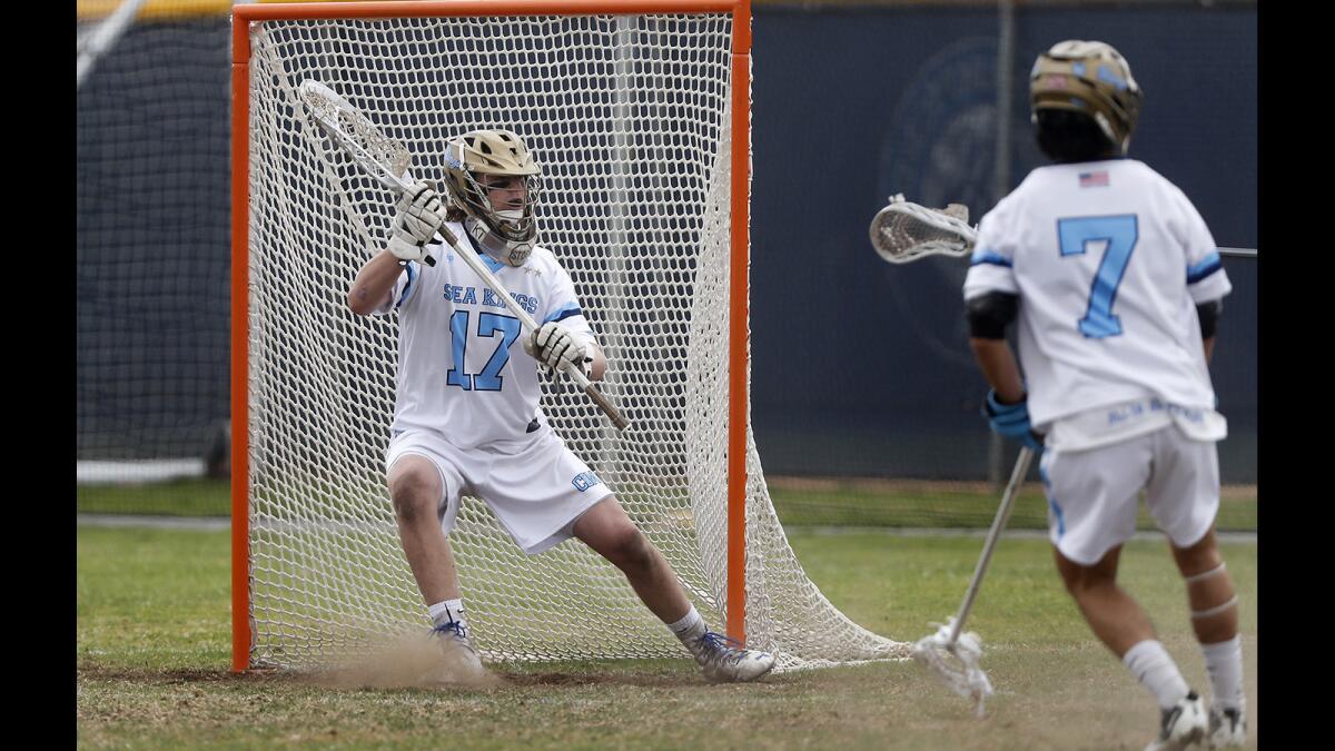 Corona del Mar goalkeeper Kyle Cord (17) protects the net during the first half against Tesoro in a nonleague match on March 31.