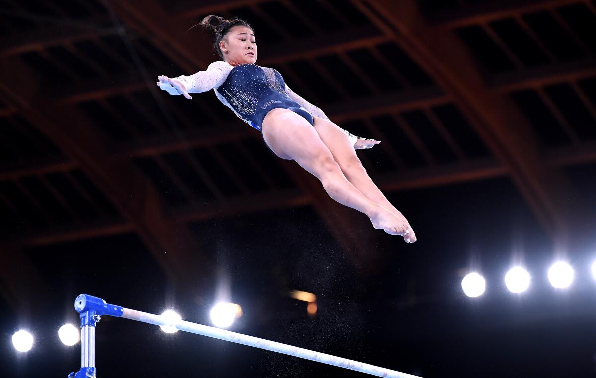 Sunisa Lee competes on the uneven bars at the Olympics on Thursday.