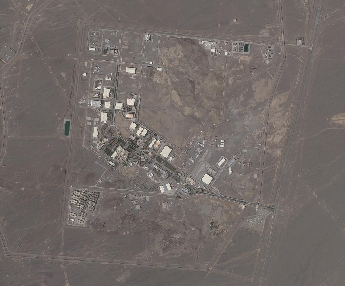 This satellite photo provided from Planet Labs Inc. shows Iran's Natanz nuclear facility on Wednesday, April 14, 2021. Iran began enriching uranium Friday, April 16, 2021, to its highest level ever at Natanz, edging closer to weapons-grade levels to pressure talks in Vienna aimed at restoring its nuclear deal with world powers after an attack on the site. (Planet Labs via AP)