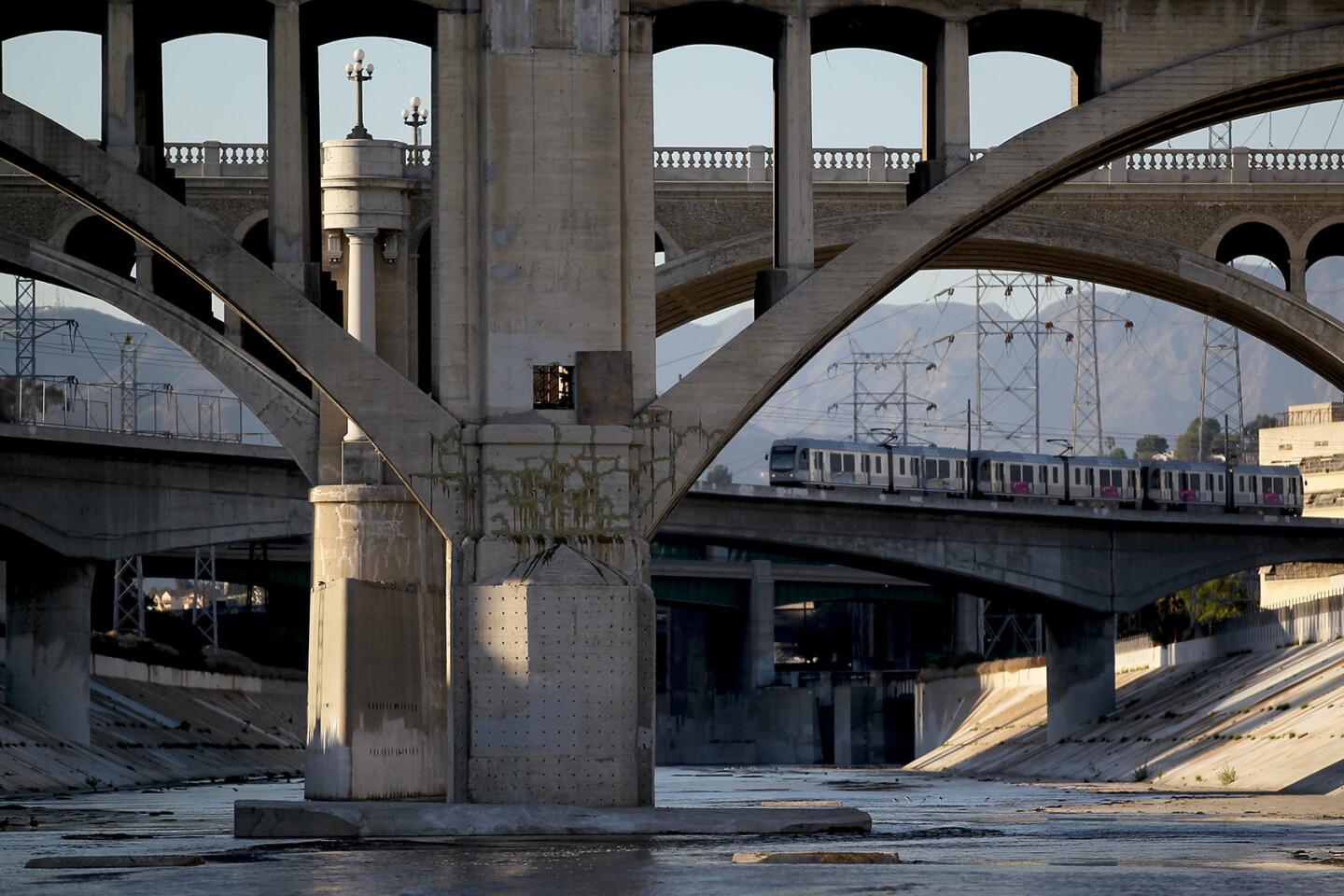 A Metro Line train crosses over the L.A. River.