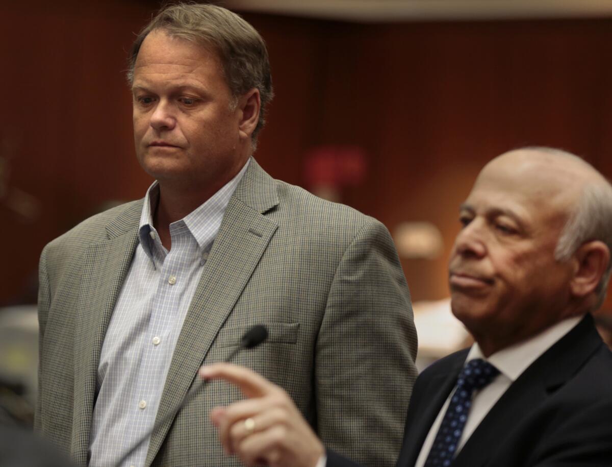 Former teacher Joseph Thomas Koetters, left, appears at his arraignment on felony sex counts on Feb. 25.