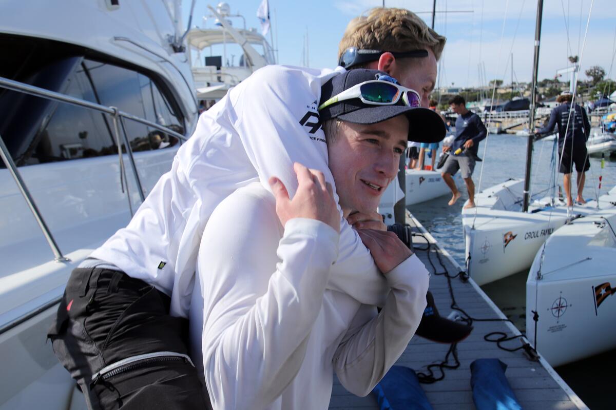 Jordan Stevenson celebrates after winning the 55th Governor's Cup International Youth Match Racing Championship.