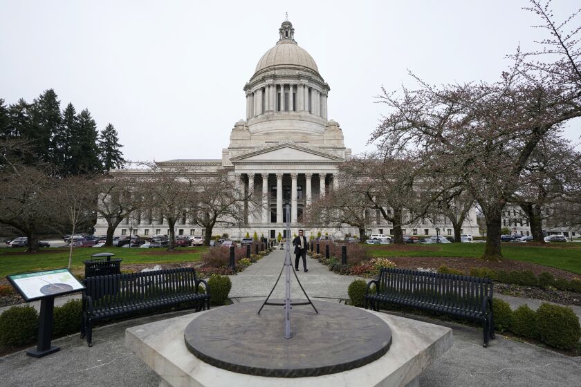 FILE - The sun dial stands in front of the Legislative Building, March 10, 2022, at the state Capitol in Olympia, Wash. The Washington Supreme Court on Friday, March 24, 2023, upheld the state's new capital gains tax, which was adopted by lawmakers in an effort to balance what is considered the nation's most regressive tax code. (AP Photo/Ted S. Warren, File)