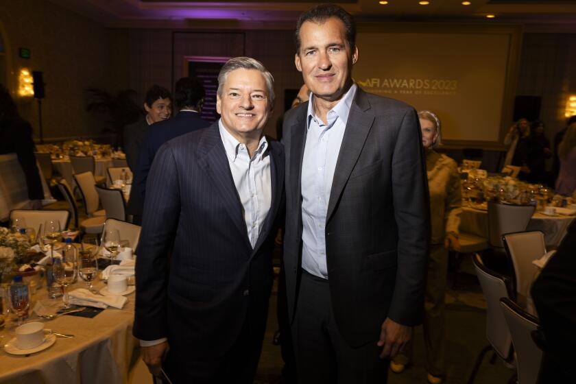 Los Angeles, CA - January 12: Ted Sarandos, Netflix CO-CEO and Scott Stuber, Chairman of Netflix mingled during the 2023 American Film Institute Awards, at Four Seasons Hotel , in Los Angeles, CA, Friday, Jan. 12, 2024. (Jay L. Clendenin / Los Angeles Times)