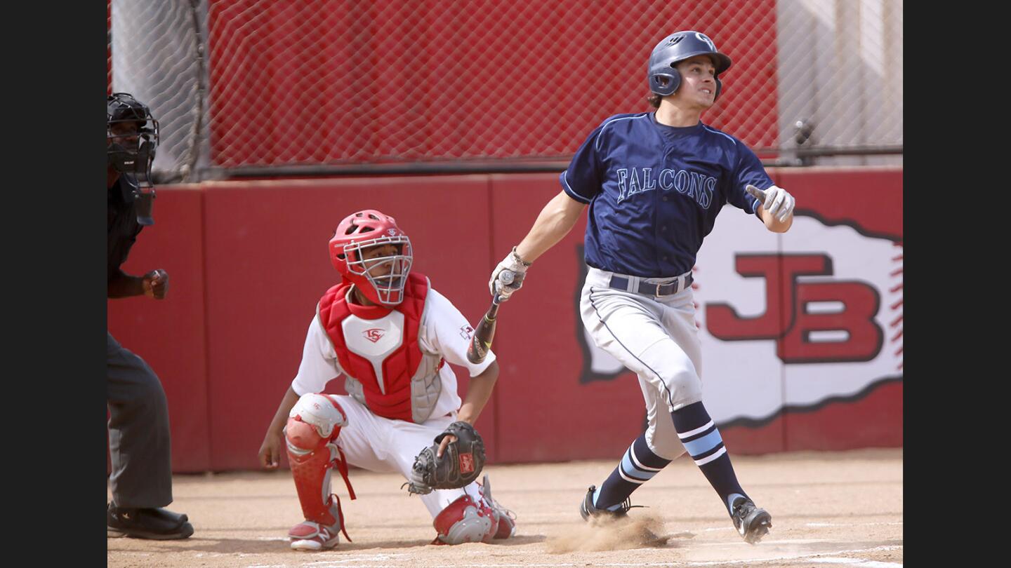 Crescenta Valley High School baseball player #44 Max Meyer hits a three-run double in game vs. Burroughs High School at the Indians home field in Burbank on Friday, May 5, 2017.