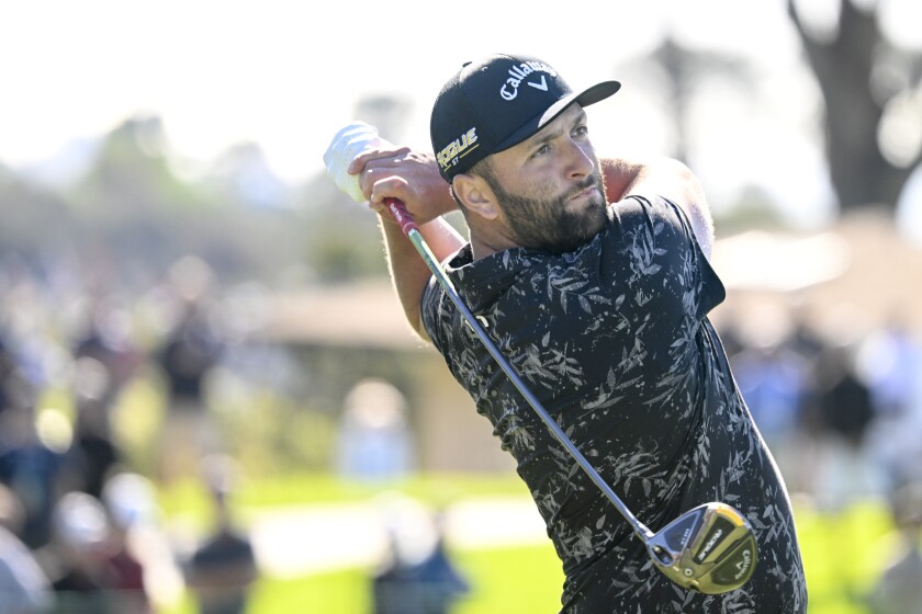 Jon Rahm of Spain hits his tee shot on the eighth hole of the North Course during the second round of the Farmers Insurance Open golf tournament, Thursday Jan. 27, 2022, in San Diego. (AP Photo/Denis Poroy)
