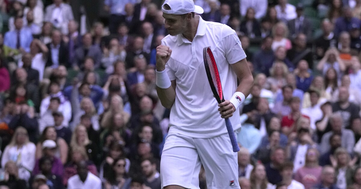 In the twilight at Wimbledon and of his career, John Isner pulls out a thrilling win