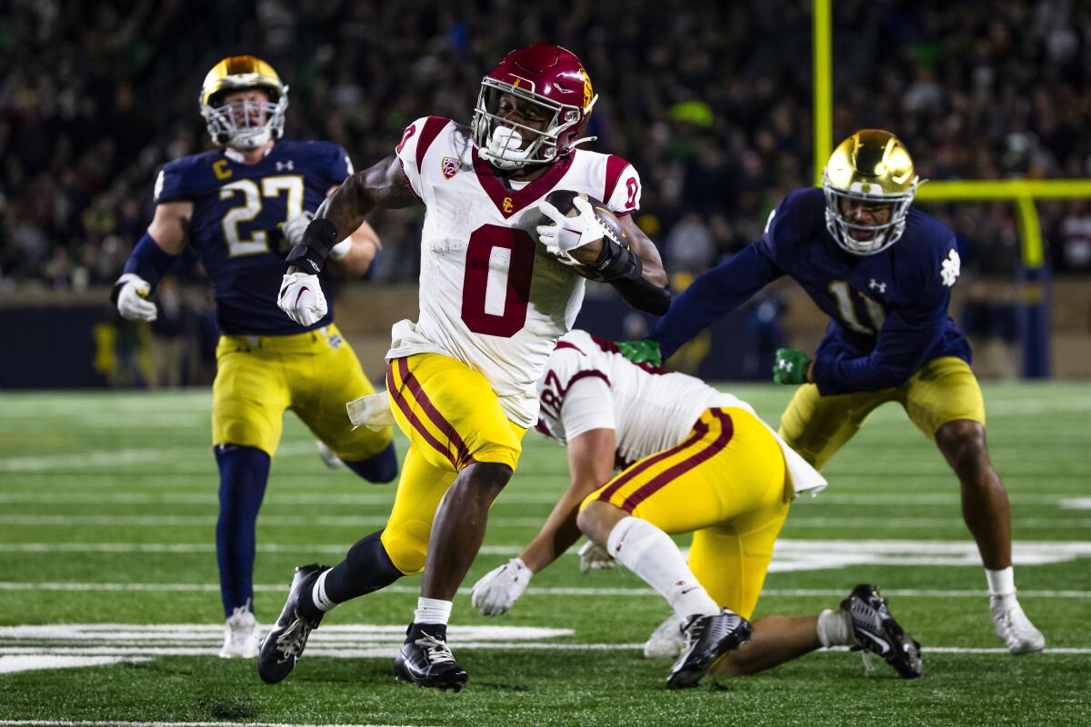 USC running back MarShawn Lloyd carries the ball during a loss to Notre Dame on Oct. 14.