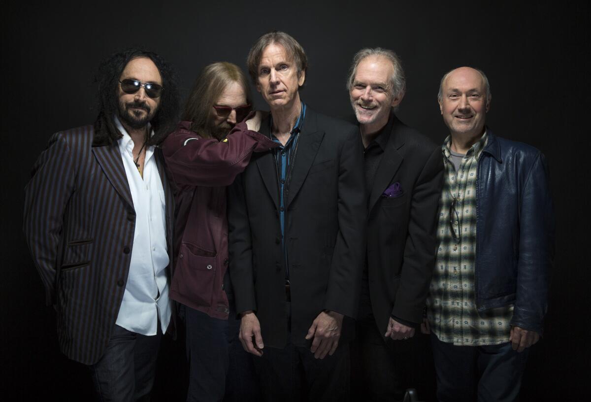 Mudcrutch, the band rock musician Tom Petty formed in Florida before coming to California in the mid-1970s and then forming the Heartbreakers, includes guitarist Mike Campbell, left, Petty, guitarist Tom Leadon, keyboardist Benmont Tench and drummer Randall Marsh.