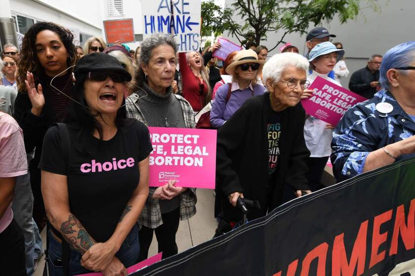 Abortion rights advocates rally to protest new restrictions on abortions, May 21, 2019, in West Hollywood, California. - Demonstrations were planned across the US on Tuesday in defense of abortion rights, which activists see as increasingly under attack. The "Day of Action" rallies come after the state of Alabama passed the country's most restrictive abortion ban, prohibiting the procedure in all cases, even rape and incest, unless the mother's life is at risk. Alabama is among about 14 states which have adopted laws banning or drastically restricting access to abortion, according to activists. (Photo by Robyn Beck / AFP)ROBYN BECK/AFP/Getty Images ** OUTS - ELSENT, FPG, CM - OUTS * NM, PH, VA if sourced by CT, LA or MoD **