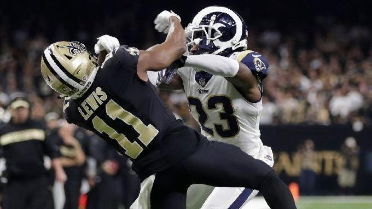 Rams cornerback Nickell Robey-Coleman pushes New Orleans Saints receiver Michael Thomas during second half of the NFC title game.