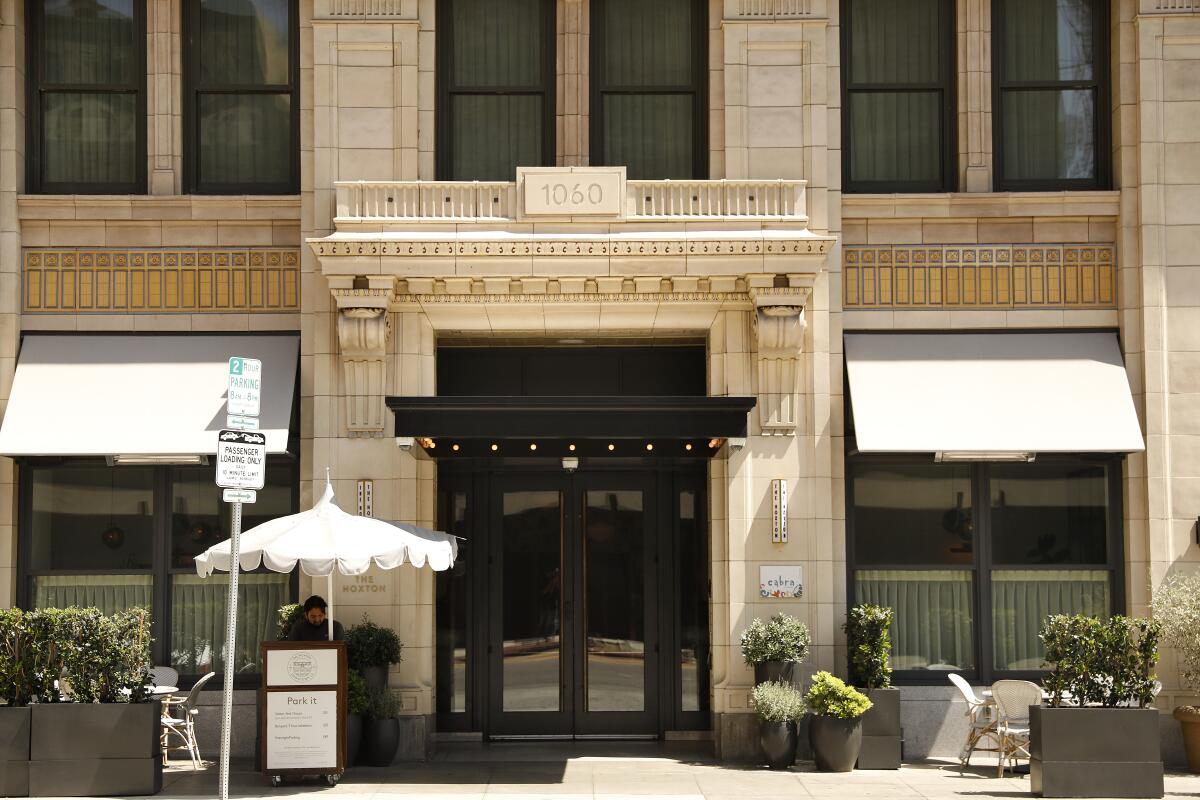 An exterior of the lobby entrance to the Hoxton hotel in downtown Los Angeles.