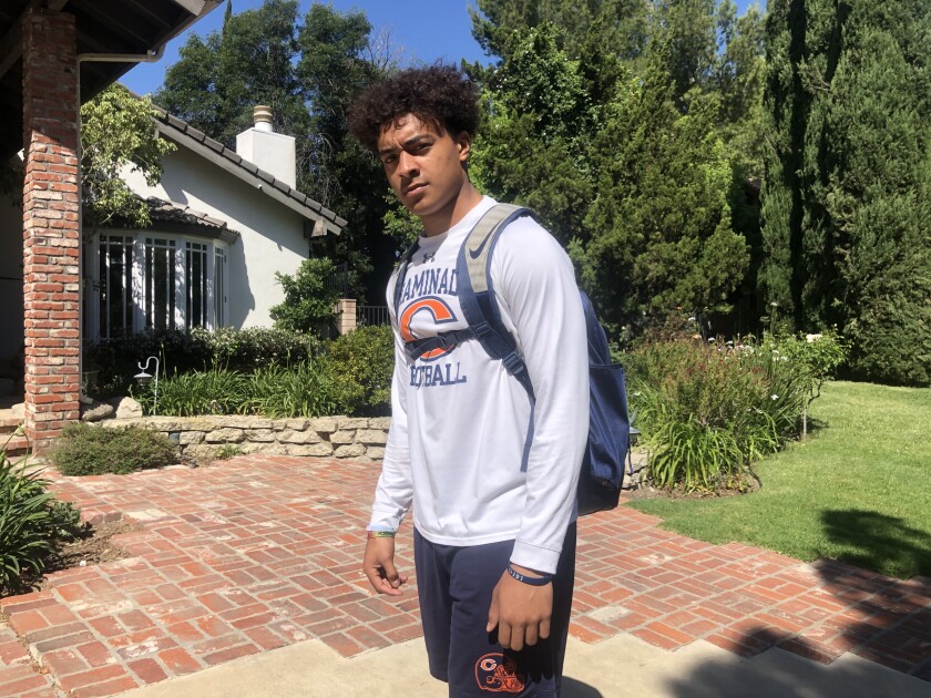 Receiver Jordan McIntyre of Chaminade has been doing daily workouts at home during quarantine using a backpack and filling it with sand bags, bricks or anything he can find.