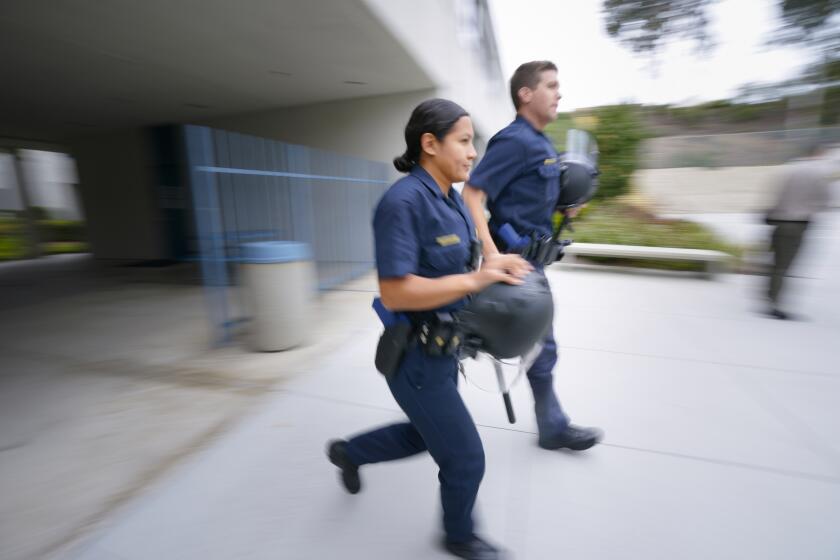 San Diego, CA - May 09: Recruits sprints off to her next training session at the Public Safety Training Institute at Miramar College on Thursday, May 9, 2024, in San Diego, CA. (Nelvin C. Cepeda / The San Diego Union-Tribune)