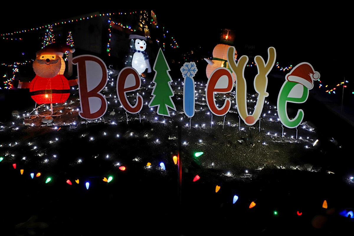 Colorful holiday themed sign that says BELIEVE at Upper Hastings Ranch Holiday Light Up