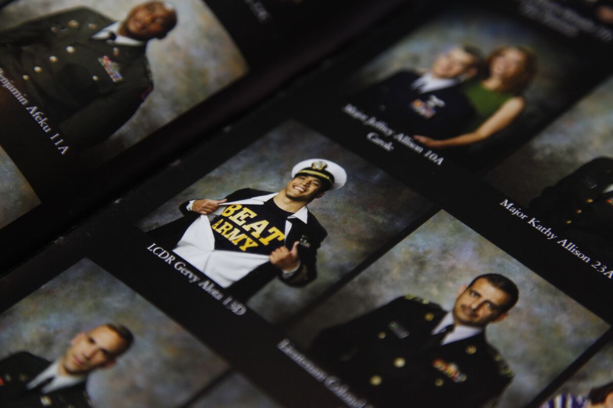 Capt. Gery Alota, then a lieutenant commander, shows off his Midshipmen pride in an all-Army school yearbook.