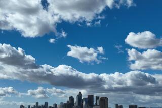 Boyle Heights, CA - February 08: A view of partially-cloudy skies with a view of the downtown Los Angeles skyline following several days of atmospheric river storms as seen from Boyle Heights Thursday, Feb. 8, 2024. (Allen J. Schaben / Los Angeles Times)