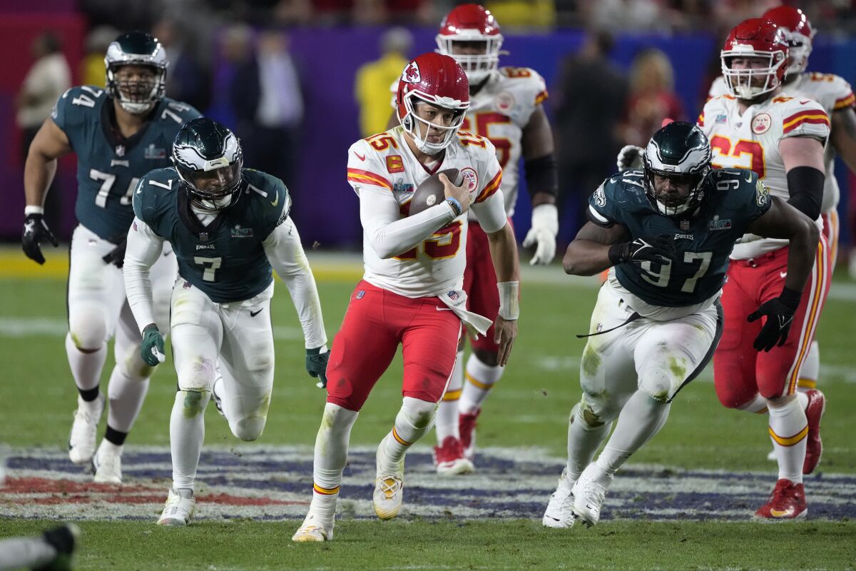 Chiefs quarterback Patrick Mahomes runs during the second half of Super Bowl LVII. 