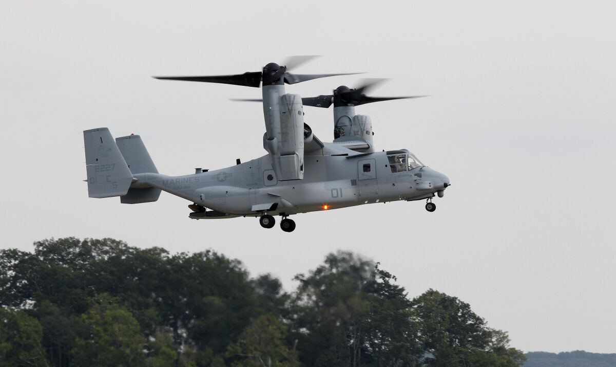 FILE - A MV-22B Osprey tiltrotor aircraft flies at Marine Corps Air Facility at Marine Corps Base in Quantico, Va., on on Aug. 3, 2012. Officials say a Marine Corps MV-22B Osprey carrying five Marines crashed in the Southern California desert, Wednesday afternoon, June 8, 2022, during training in a remote area near the community of Glamis in Imperial County. Military officials have yet to release official word on the fate of the five Marines. (AP Photo/Haraz N. Ghanbari, File)