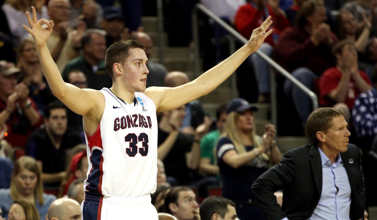 Gonzaga forward Kyle Wiltjer reacts after making one of his four three-point shots against Iowa during the Bulldogs' 87-68 victory over the Hawkeyes on Sunday.