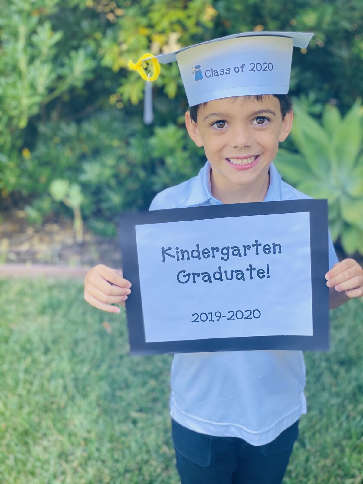 R. Roger Rowe kindergarten graduate Ivan Salmen.