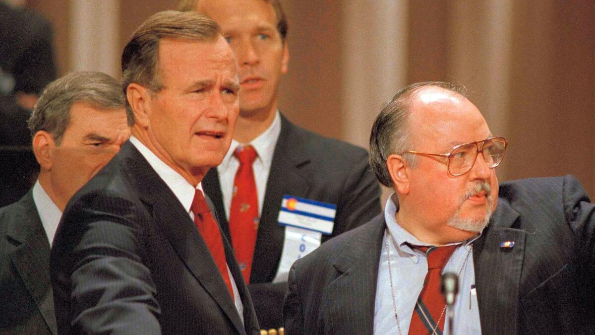 In 1988, Vice President George H.W. Bush gets some advice from his media advisor, Roger Ailes, right, prior to the start of the Republican National Convention.