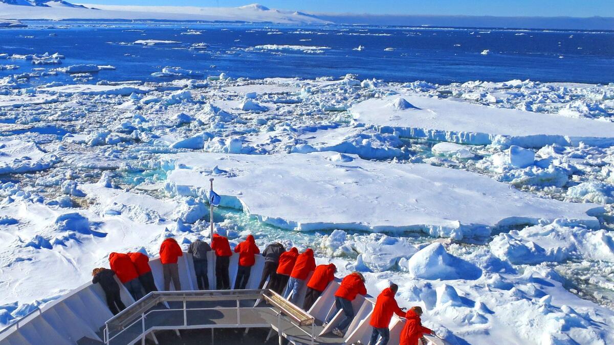 It may be easier to see Antarctica from the deck of a cruise ship. Here, passengers sail the Grandidier Channel.