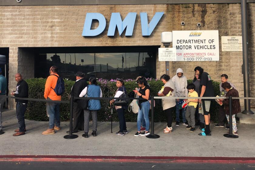 Lines stretches outside at the downtown Los Angeles DMV field office on Monday, Jan. 27.
