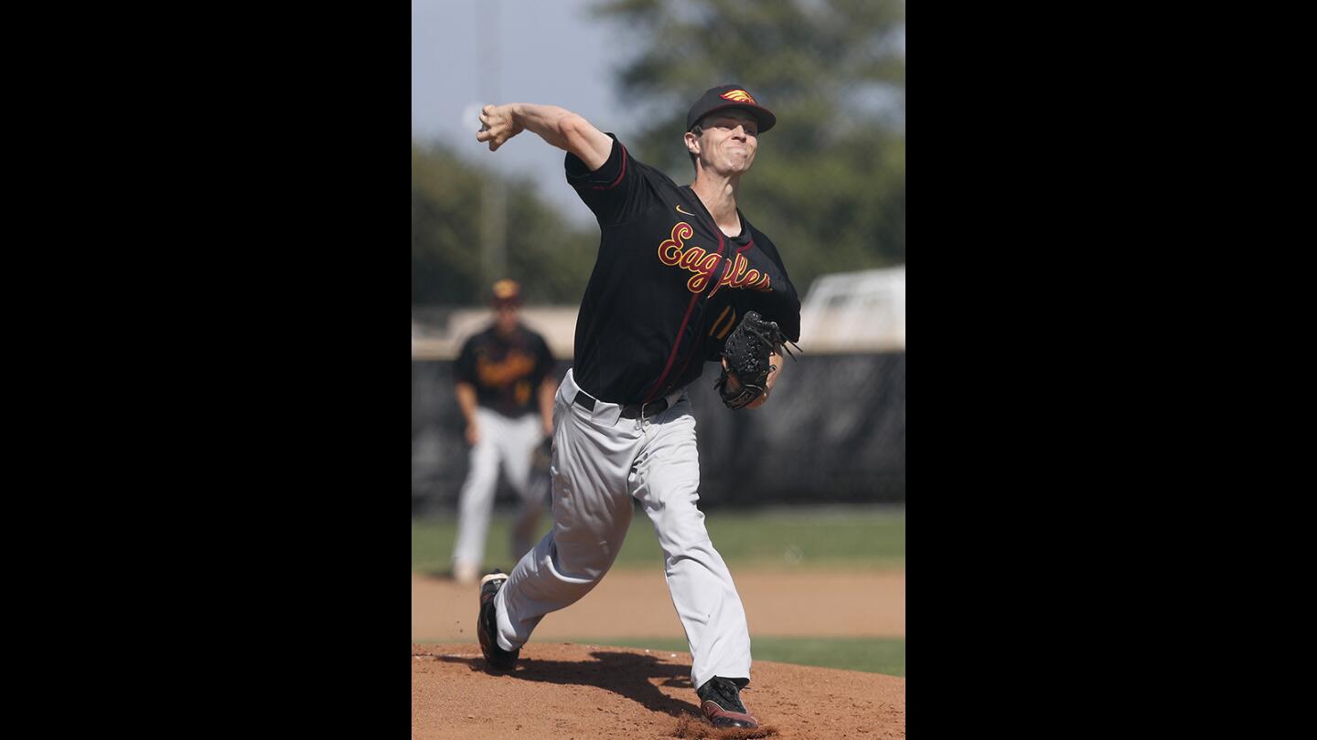 Jake Covey throws in the first inning for Estancia High in an Orange Coast League game at rival Costa Mesa on Tuesday.